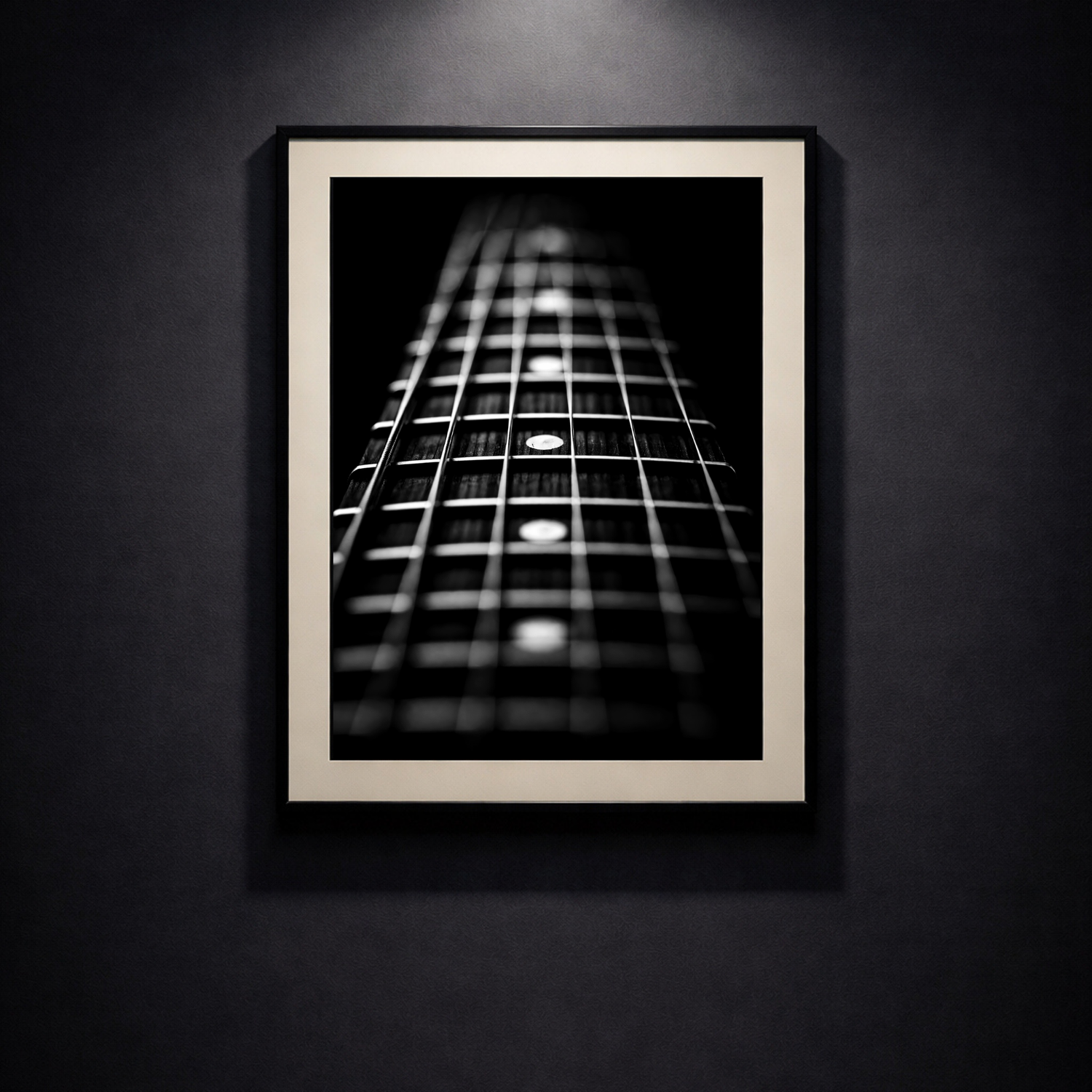 Black and white guitar prints displayed in a modern interior with framed wall art