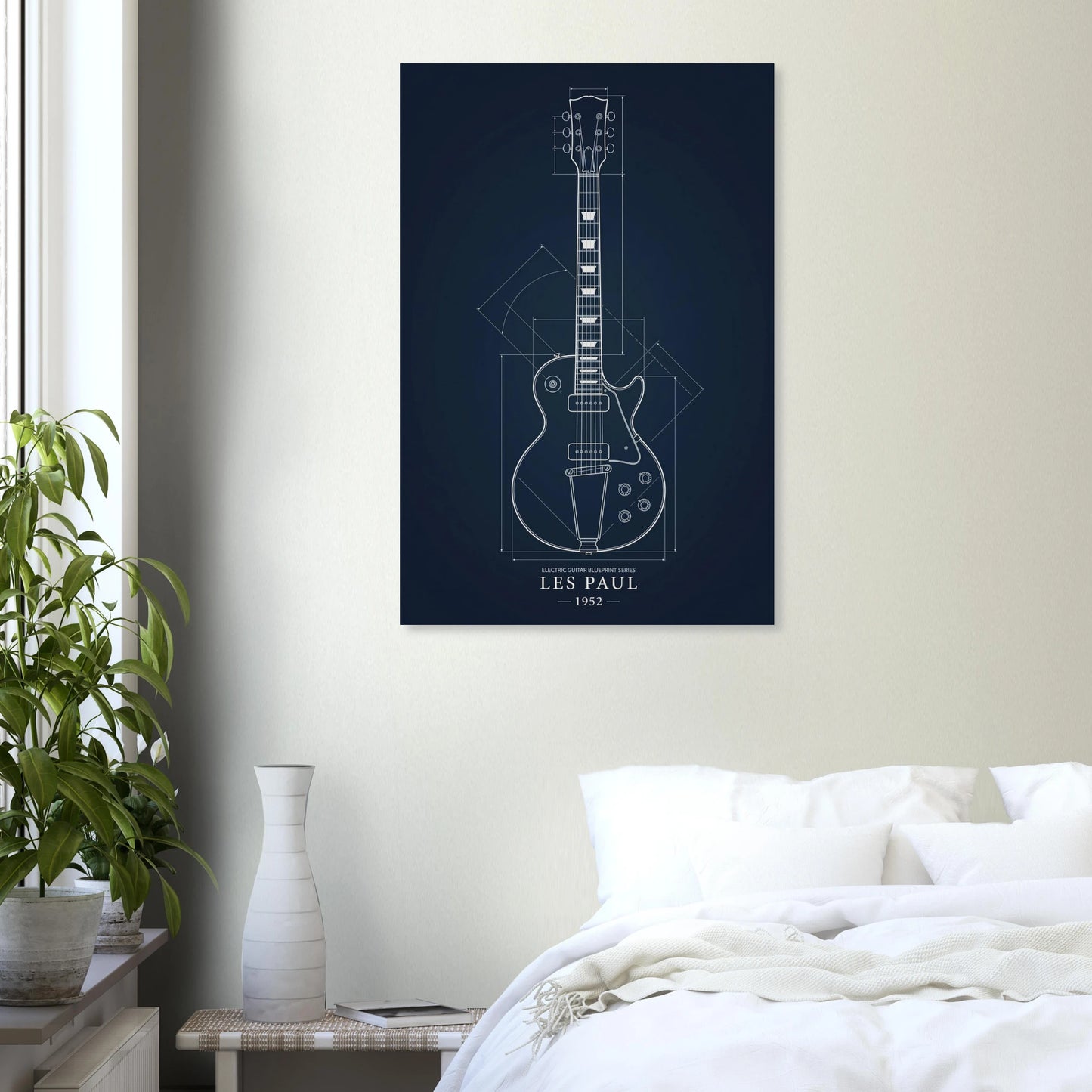 Gibson Les Paul Blueprint art print in a black frame above a bed in a modern bedroom — Guitar Prints museum-quality matte art print