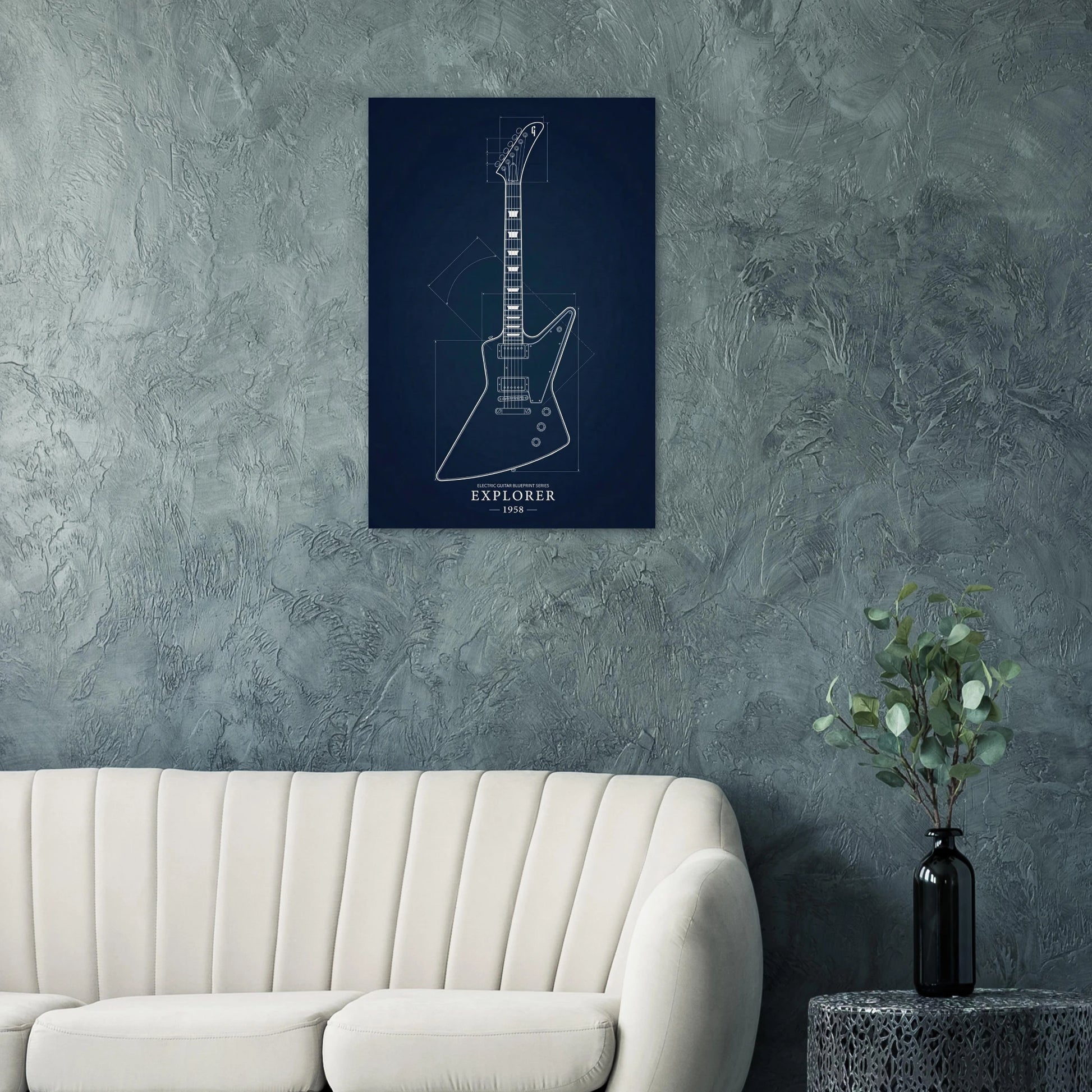 Gibson Explorer Blueprint art print on a teal wall above a modern white sofa — Guitar Prints museum-quality matte art print