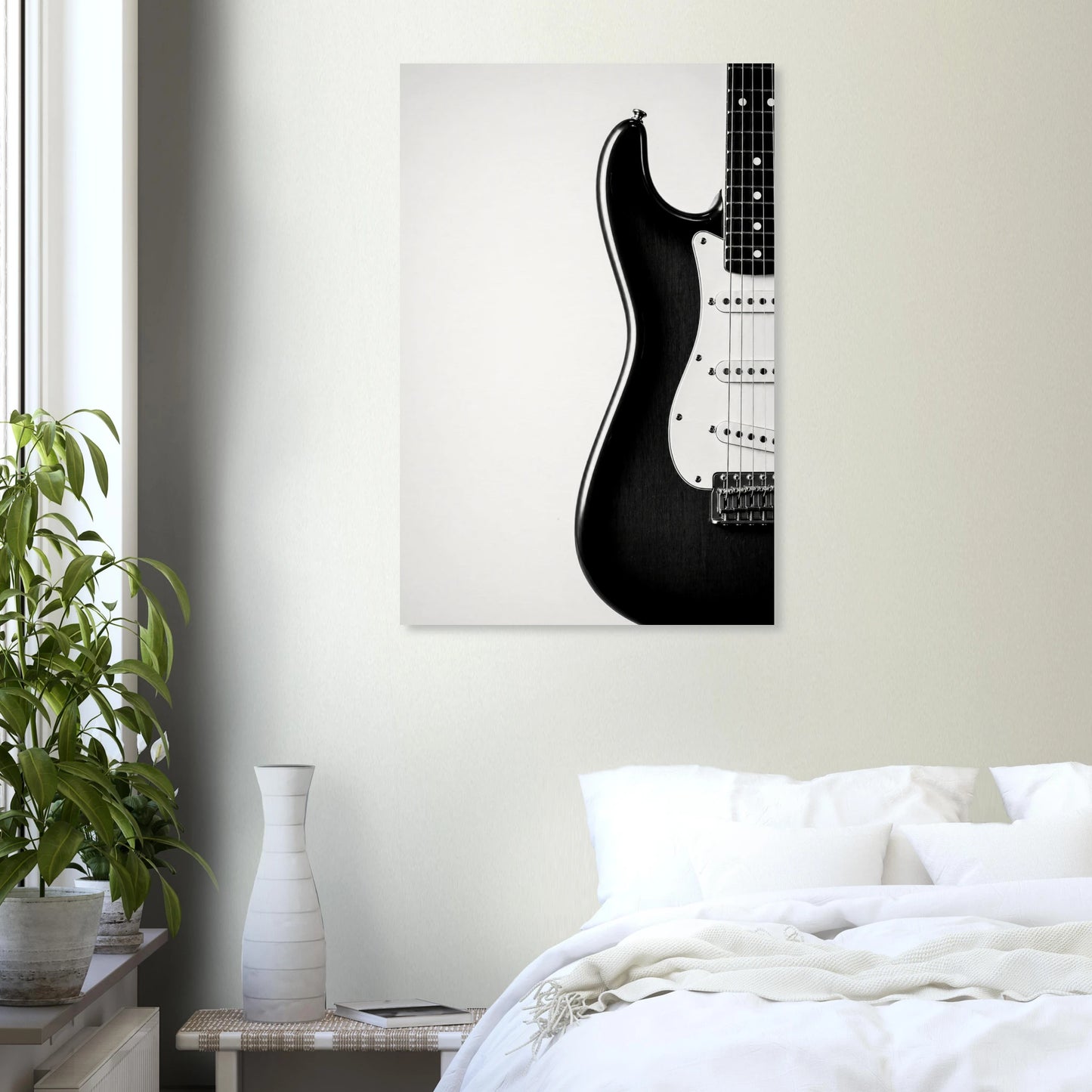 Monochrome Strat art print displayed in a white frame above a bed — Guitar Prints museum-quality matte art print