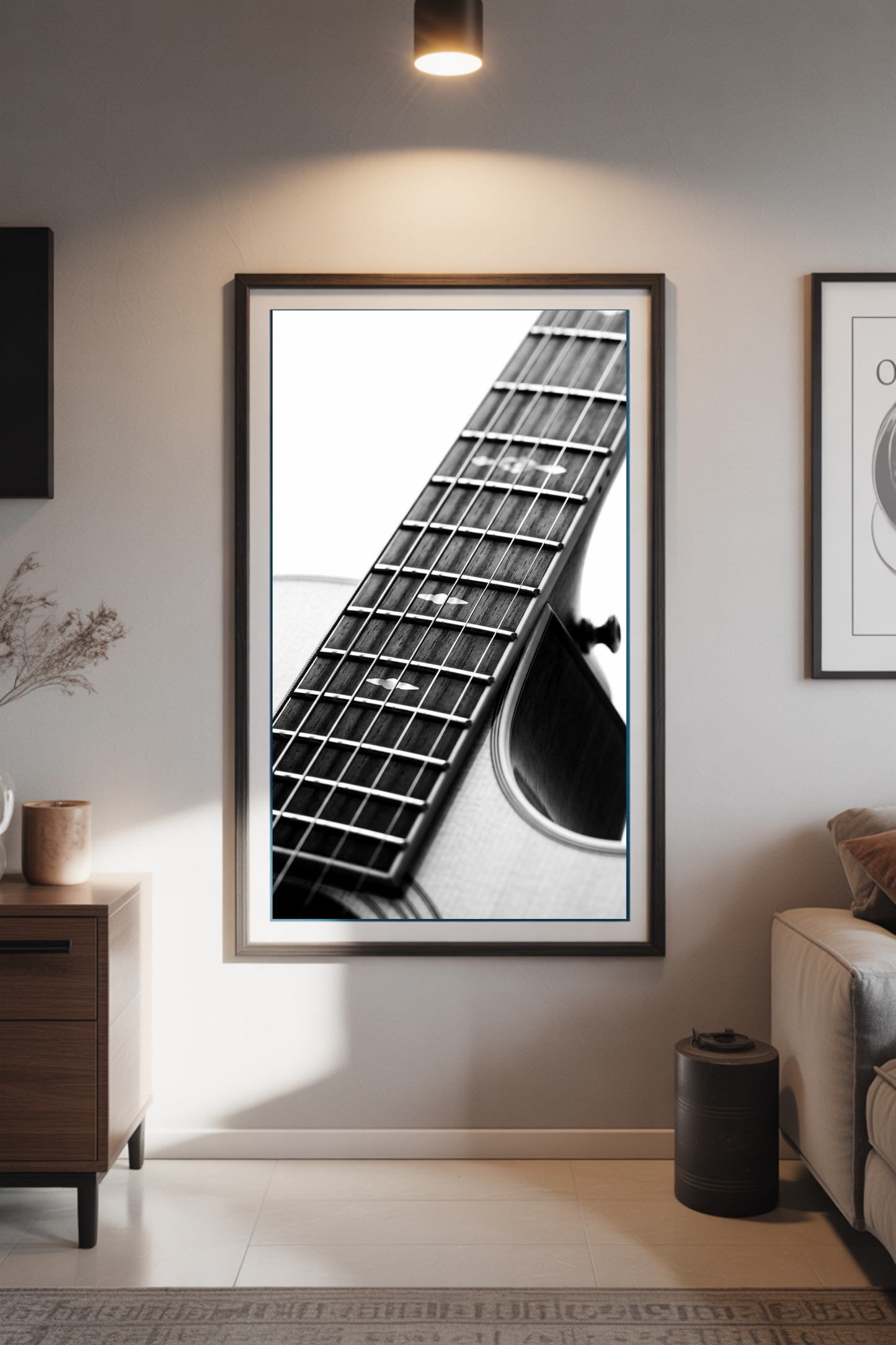 First Light acoustic guitar fretboard print in a walnut frame in a modern living room — black and white guitar wall art above sideboard