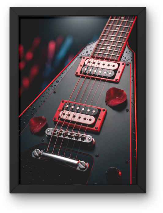 Close-up of a black electric guitar with red accents in a black frame.