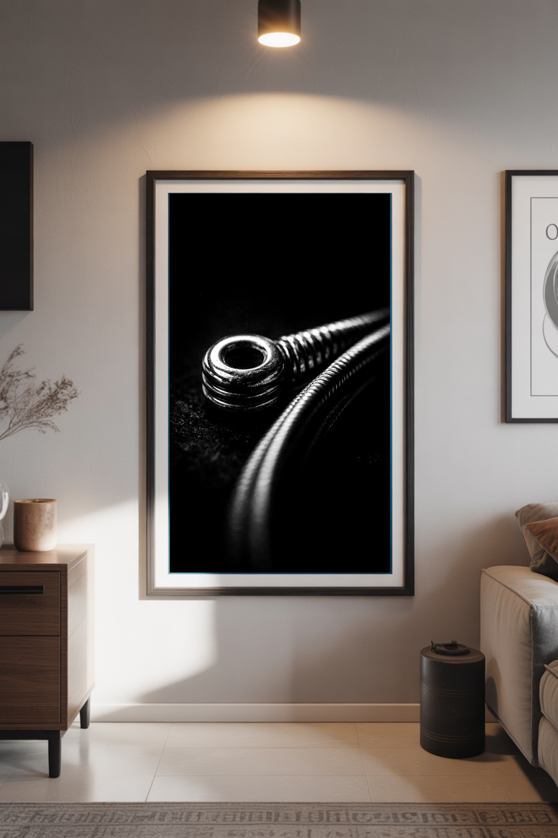 Framed guitar string macro poster in a living room setting