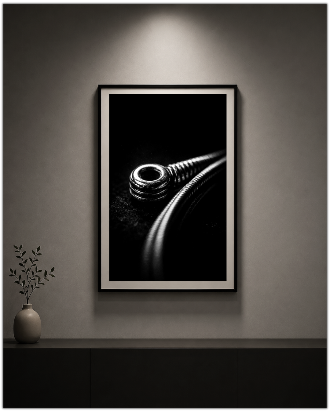 Framed guitar string macro print on a wall