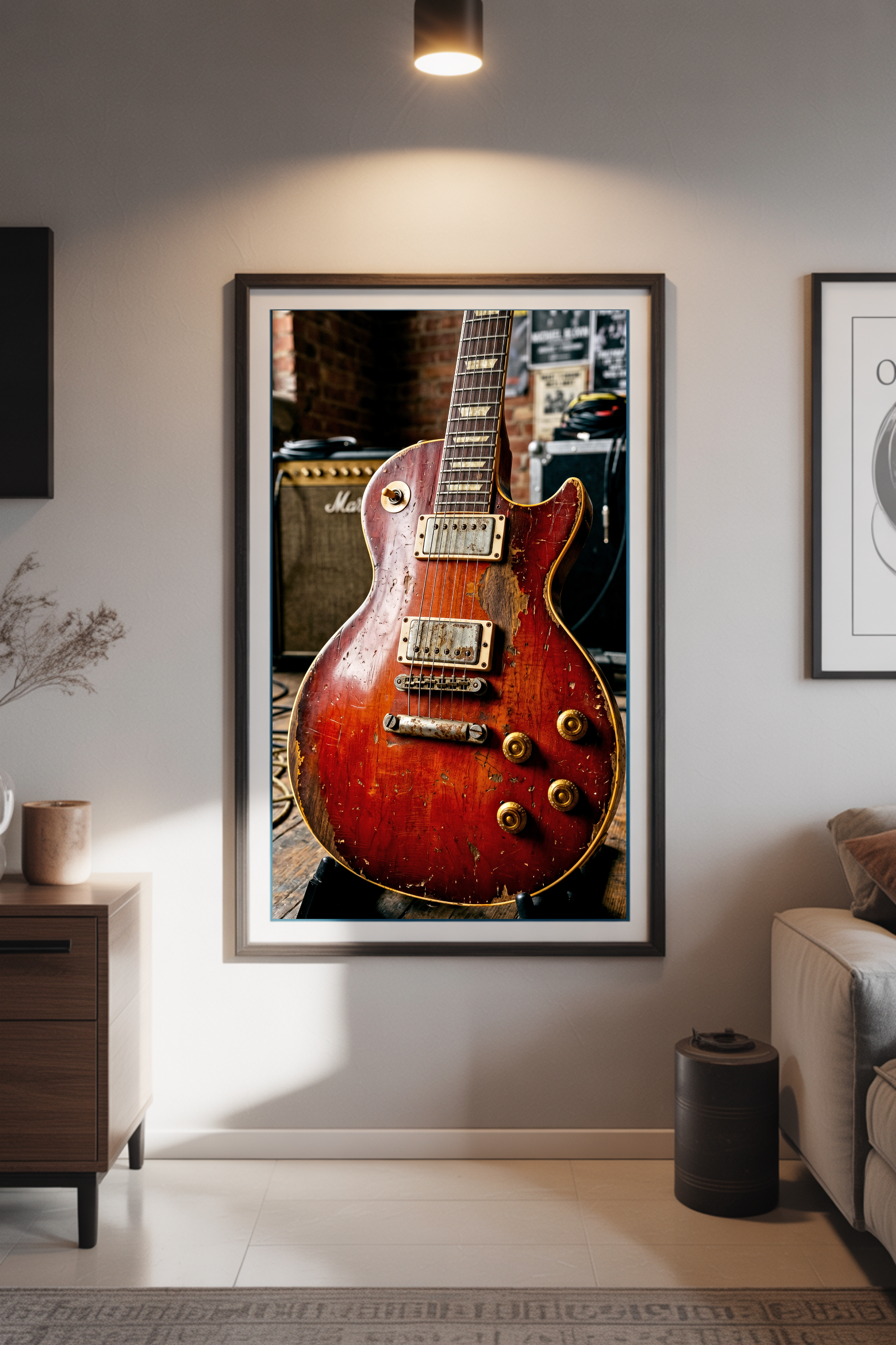 framed relic les paul guitar in a living room setting