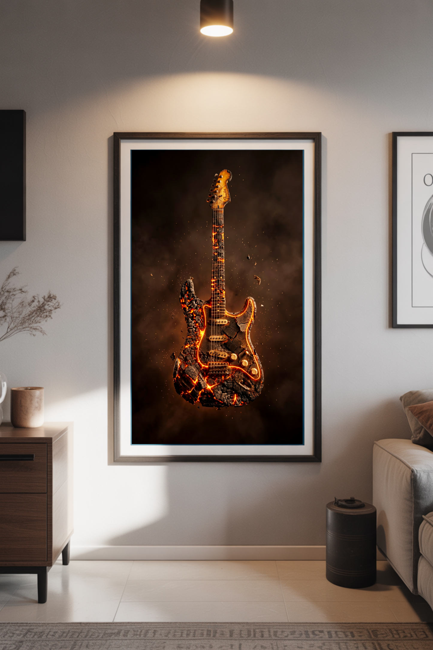 Framed artwork of a fiery guitar on a wall in a living room setting