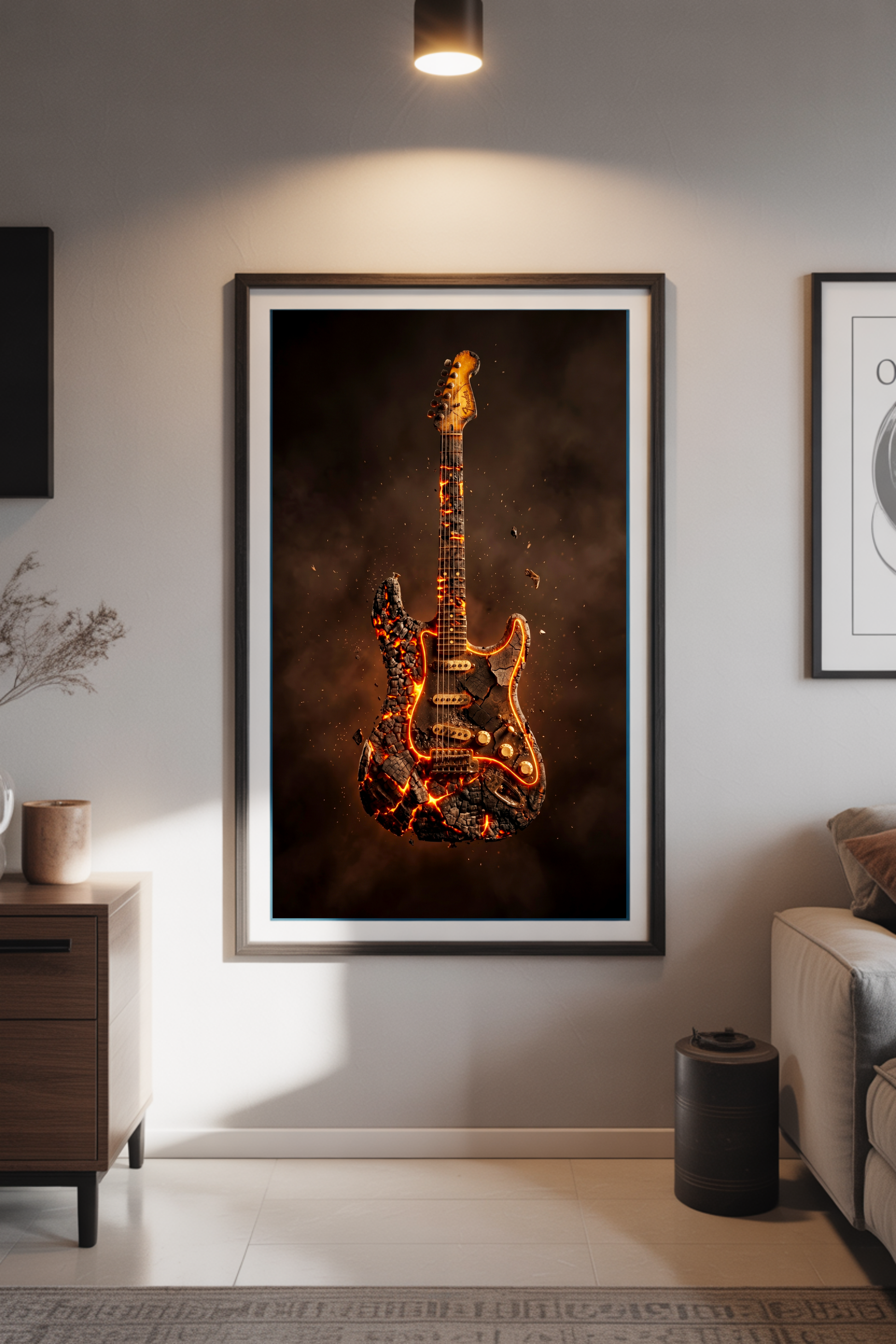 Framed artwork of a fiery guitar on a wall in a living room setting