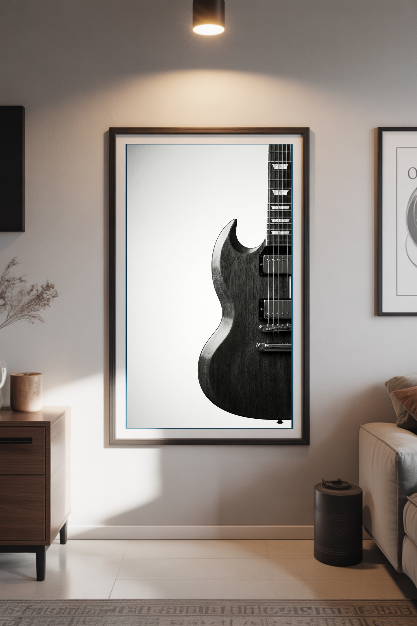 Framed picture of a gibson SG guitar on a wall in a living room setting