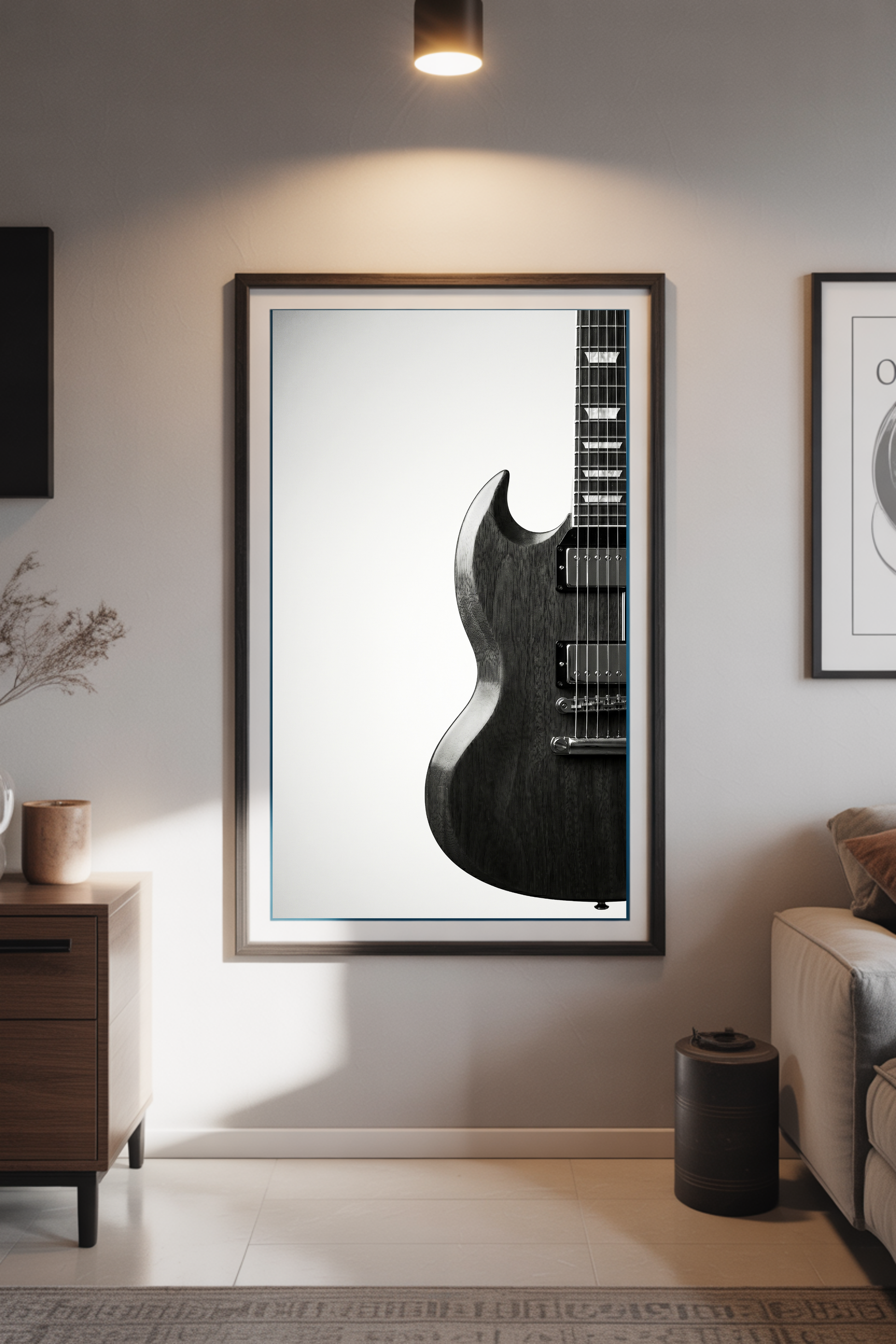 Framed picture of a gibson SG guitar on a wall in a living room setting