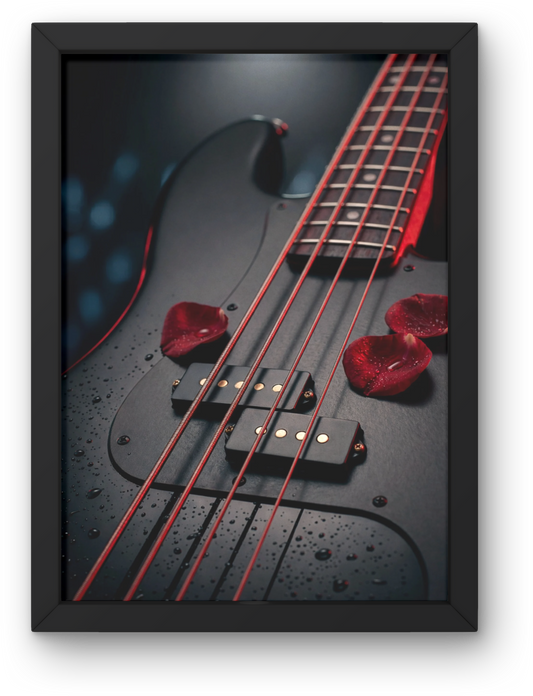 Framed artwork of a bass guitar with red strings on a dark background