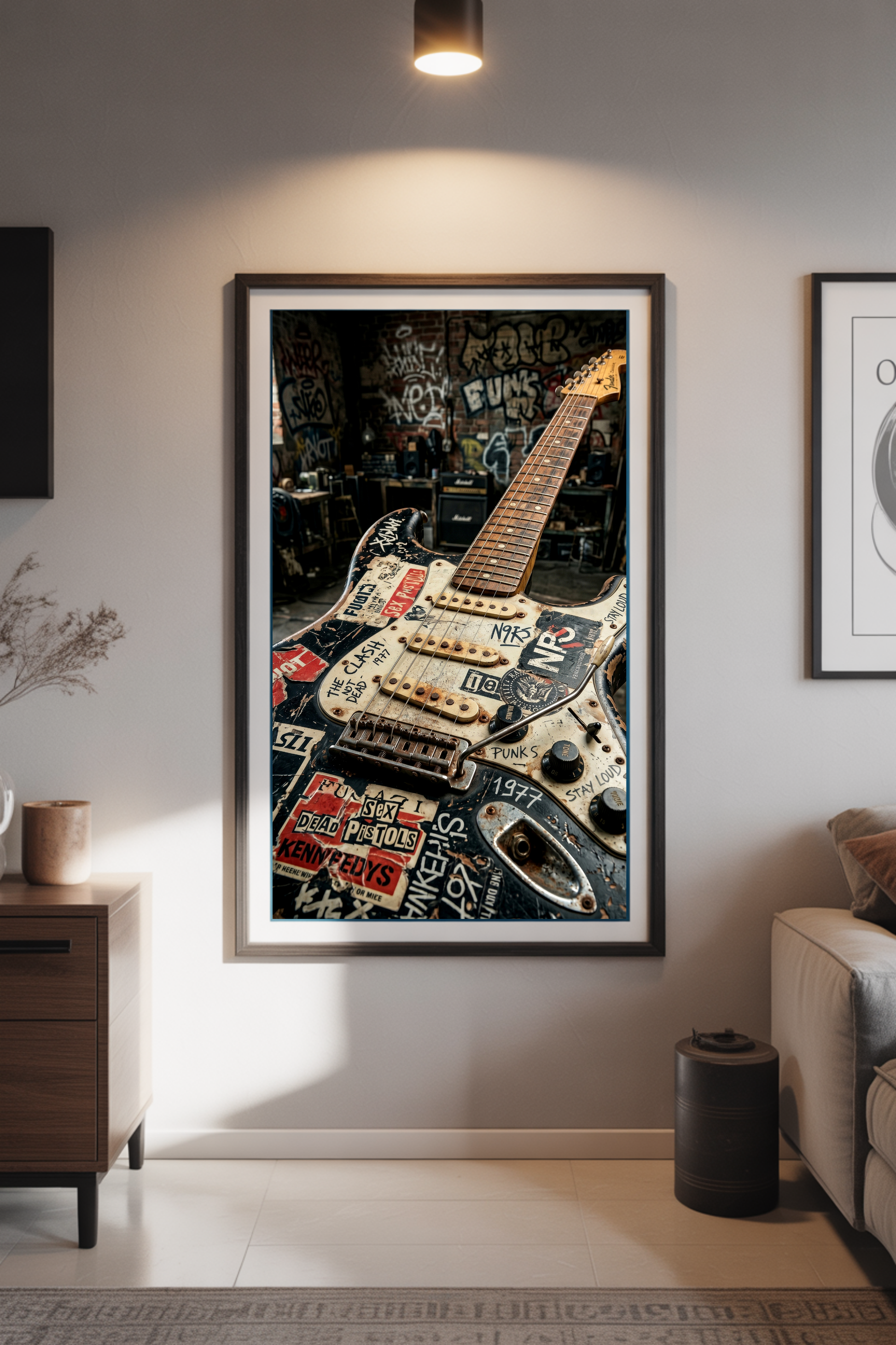 Framed artwork of a guitar on a wall in a living room setting
