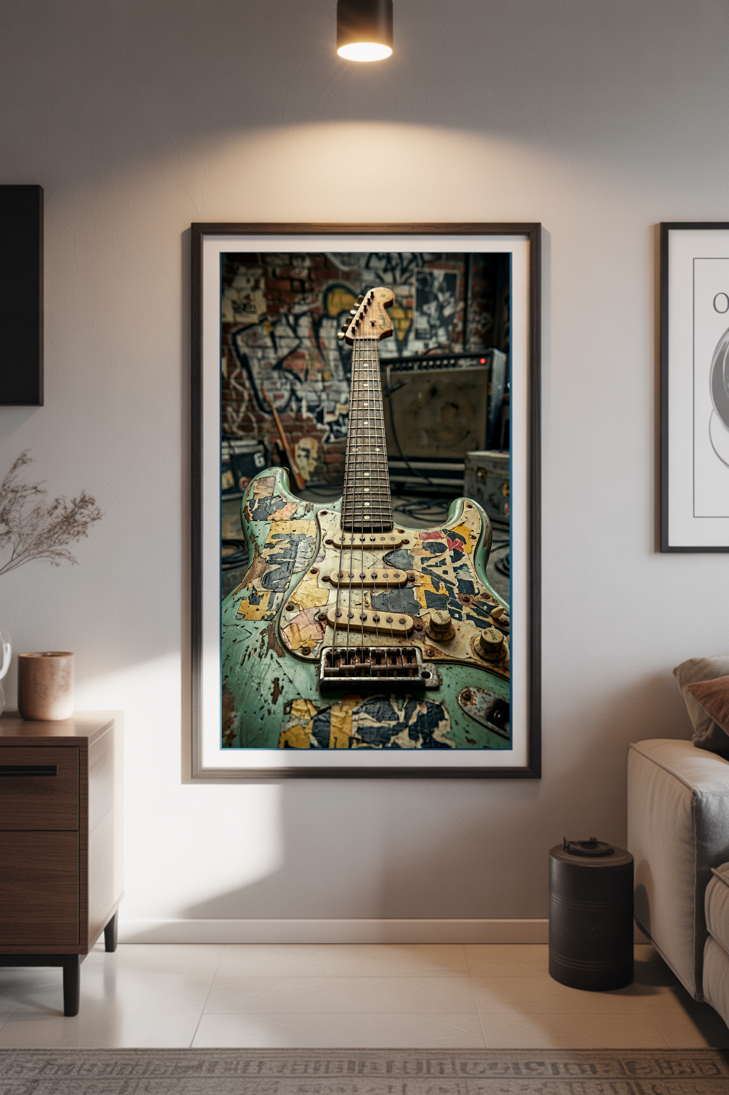 Framed artwork of a relic'd guitar on a wall in a living room setting.