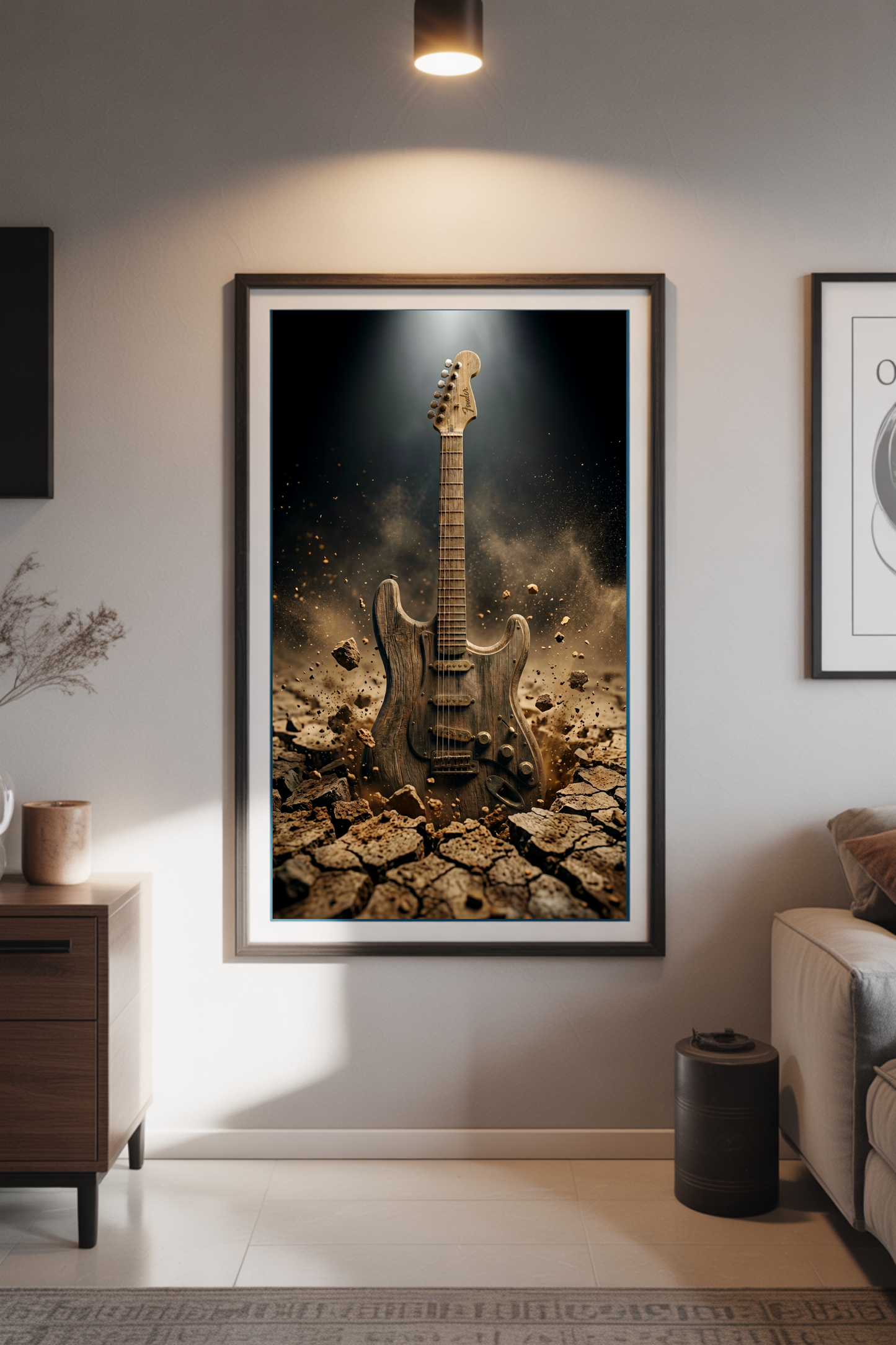 Framed artwork of a guitar on a cracked earth background in a living room setting.