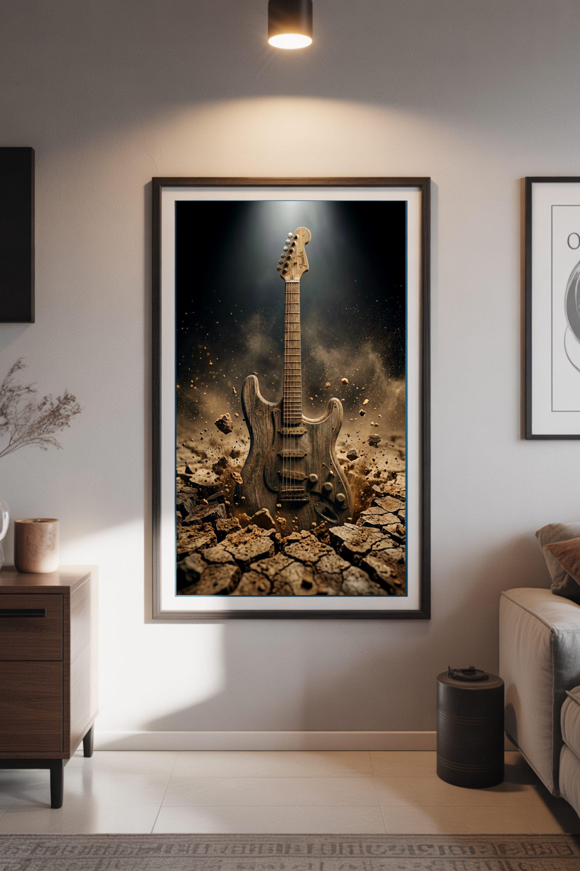 Framed artwork of a guitar on a cracked earth background in a living room setting.