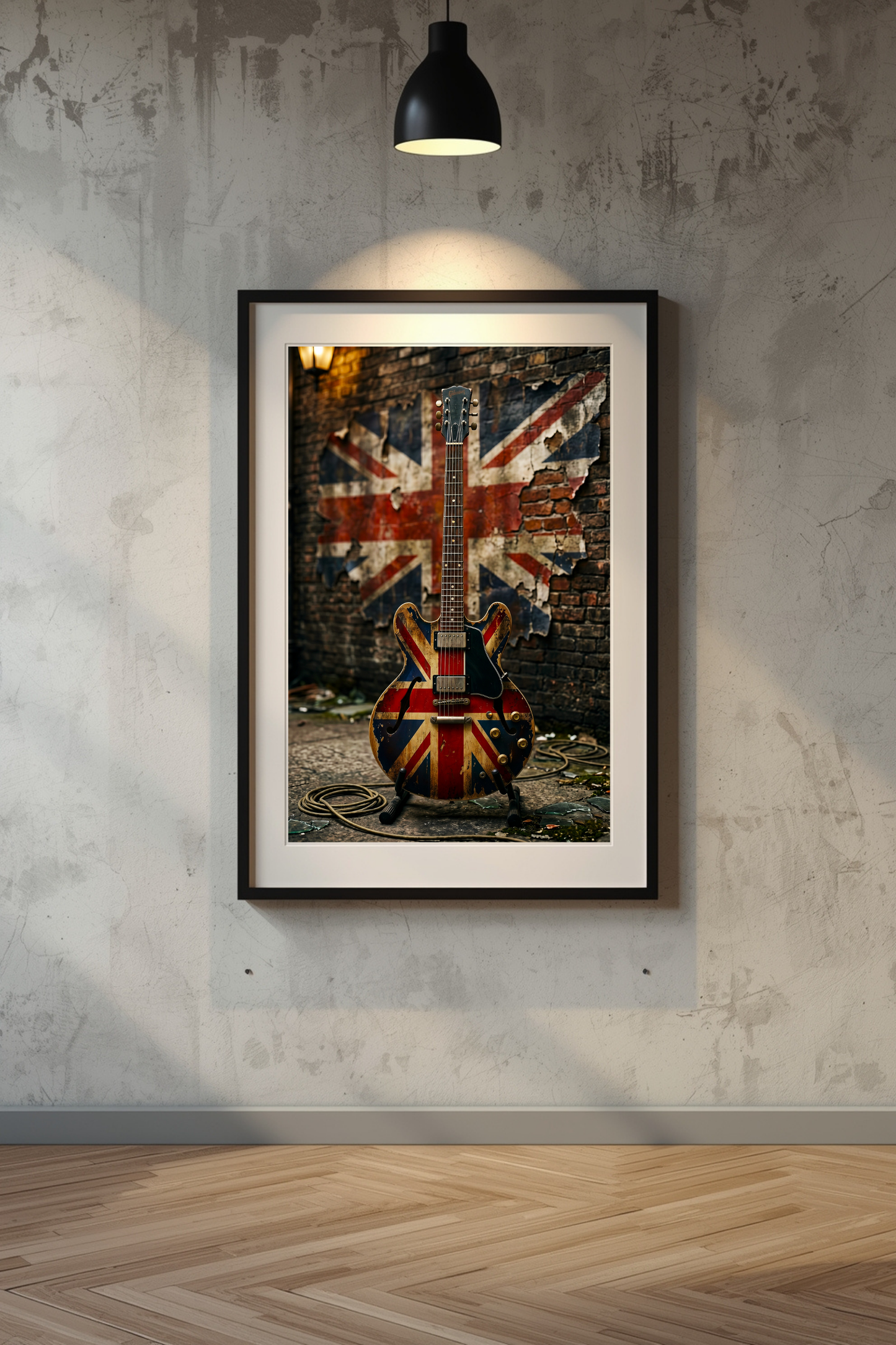 Framed artwork of a guitar with a Union Jack design on a textured wall.