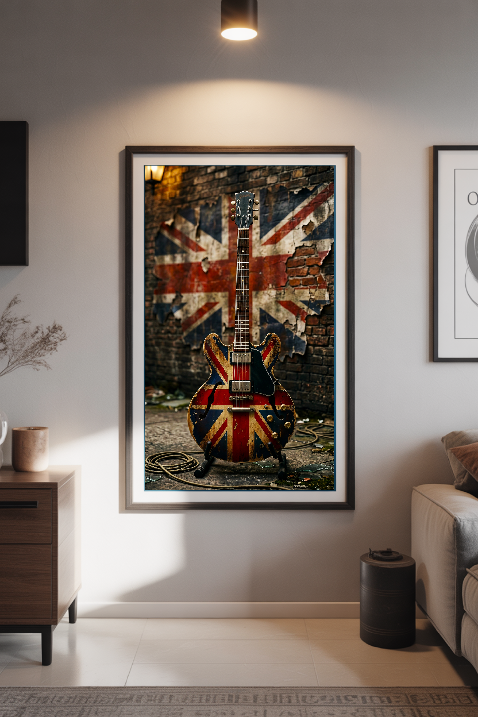 Framed artwork of a 335-style guitar with a Union Jack design on a wall in a living room.