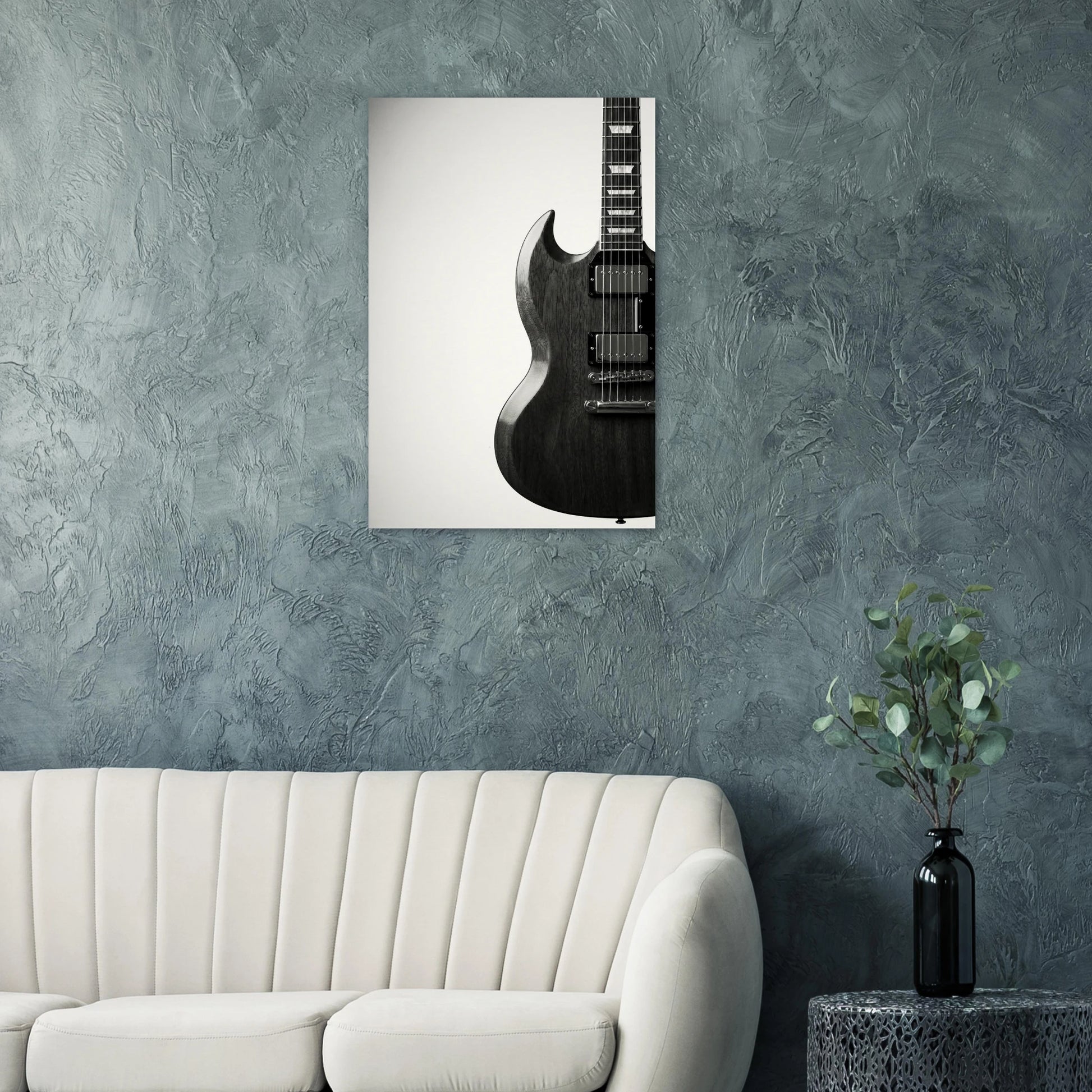 Gibson SG art print displayed on a teal wall above a modern white sofa — Guitar Prints museum-quality matte art print
