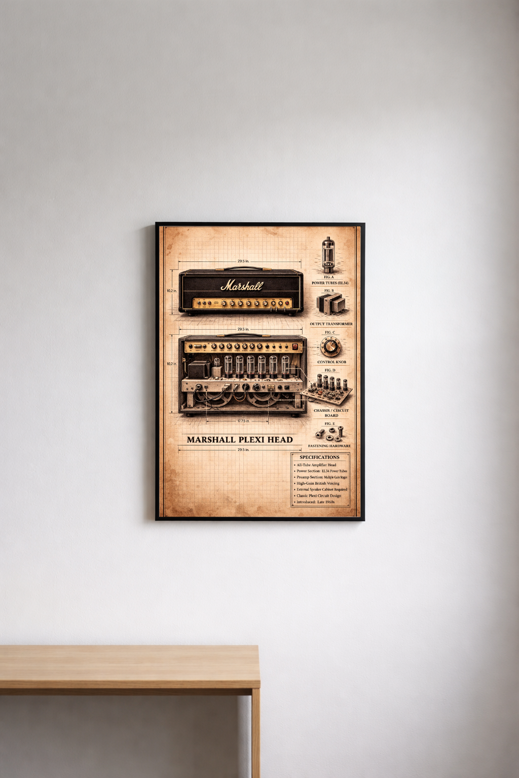 Framed poster of a Marshall Plexi Head amplifier on a wall above a wooden desk.