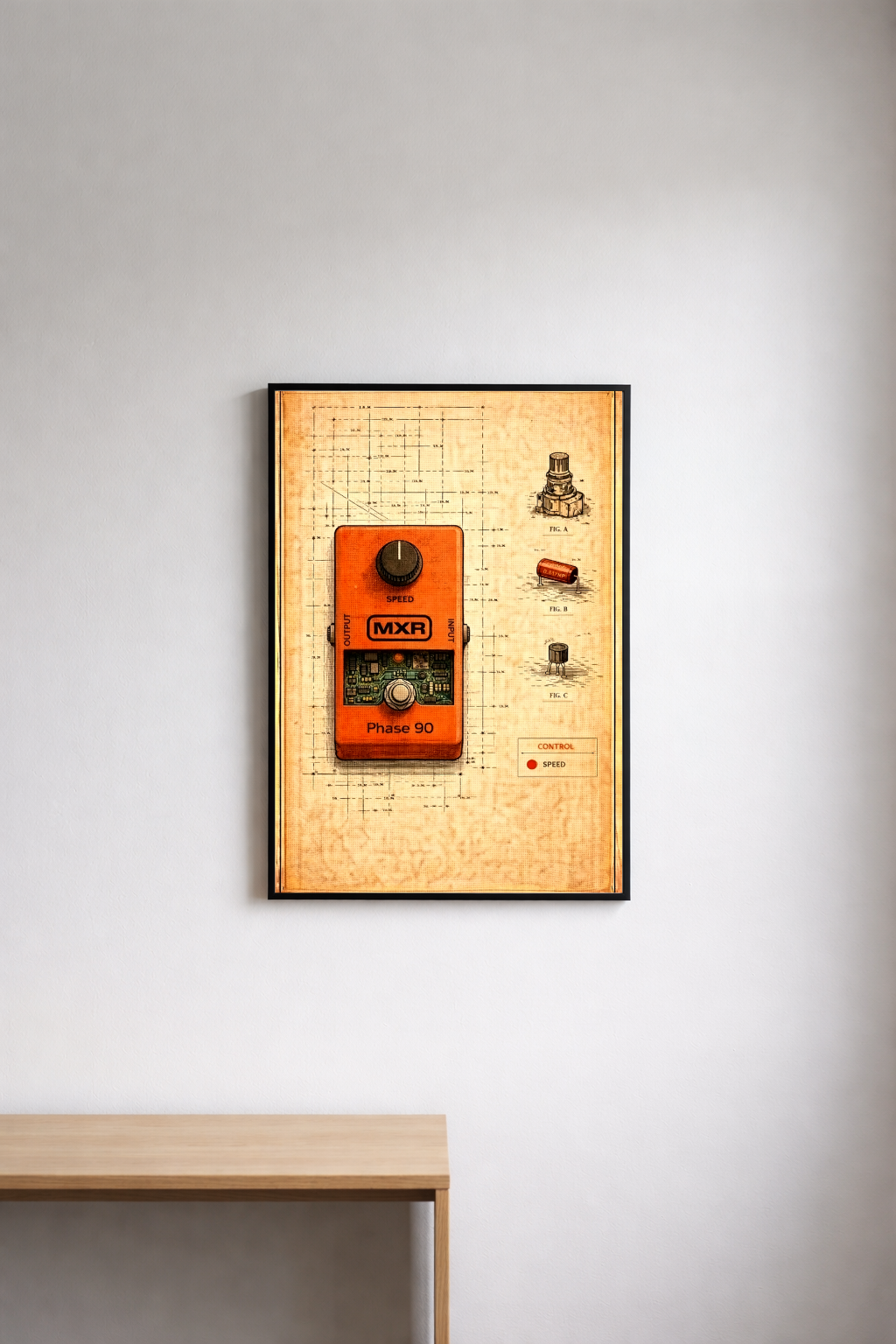 Framed poster of a guitar pedal on a wall