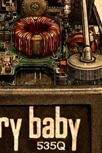 Close-up of a vintage wah pedal with 'Cry Baby 535Q' branding.